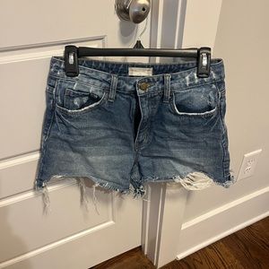 Distressed jean shorts